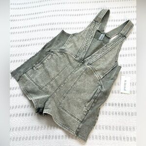 Green washed-off style romper